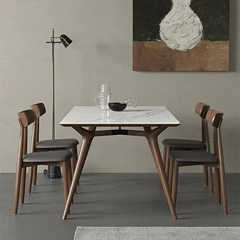 Сочетание обеденного стола и стула в итальянском минималистском стиле из массива дерева и каменной доски в скандинавском минималистичном современном стиле для небольшой семьи белого цвета.